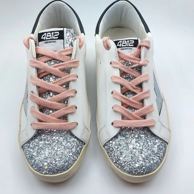 4B12 Supreme 310 trainer with silver and pink details