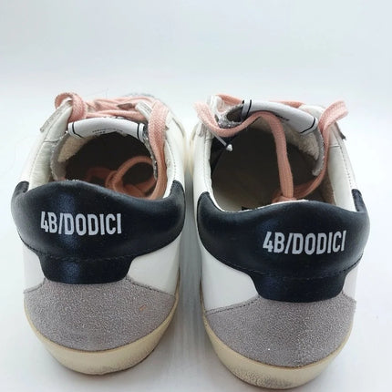 4B12 Supreme 310 trainer with silver and pink details